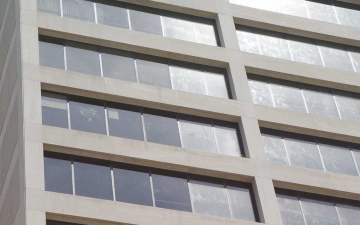 Commercial-glass-scratch-removal-services-before-and-after scratched and stained glass is on the right, restored glass is on the left