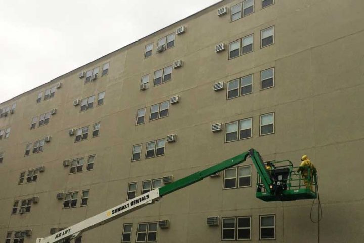Apartment building undergoing waterproofing services New York