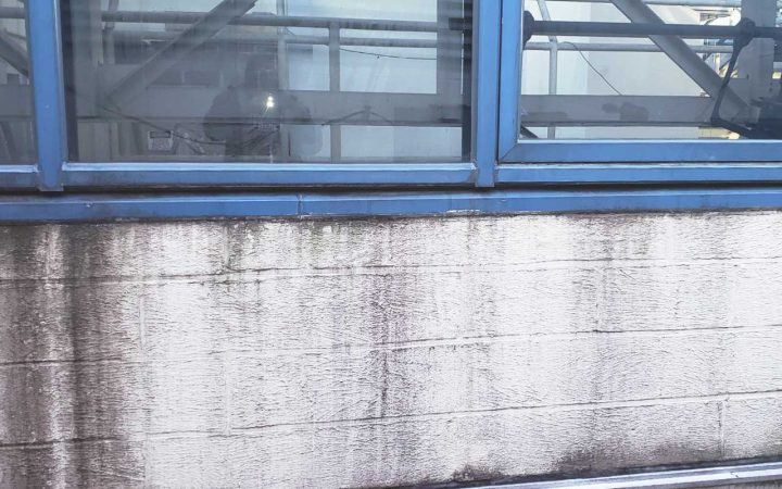 Window Frame Damage and Stains Before Commercial Building Metal Restoration Contractor