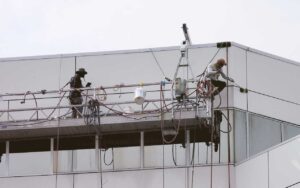 Alucobond restoration services being performed on an office building in Colorado.
