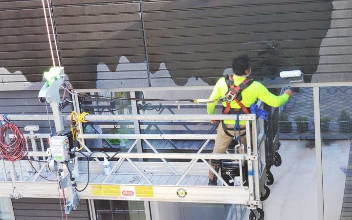 commercial building waterproofing services being performed by an expert