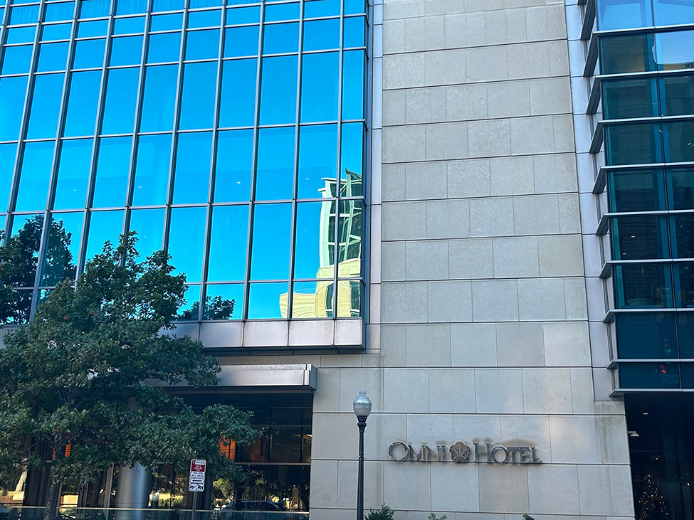 Natural stone building exterior and glass curtain wall in Fort Worth, TX