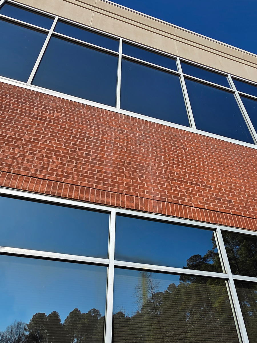 Wet glazing and window caulking repairs at a commercial building in Paducah, KY.